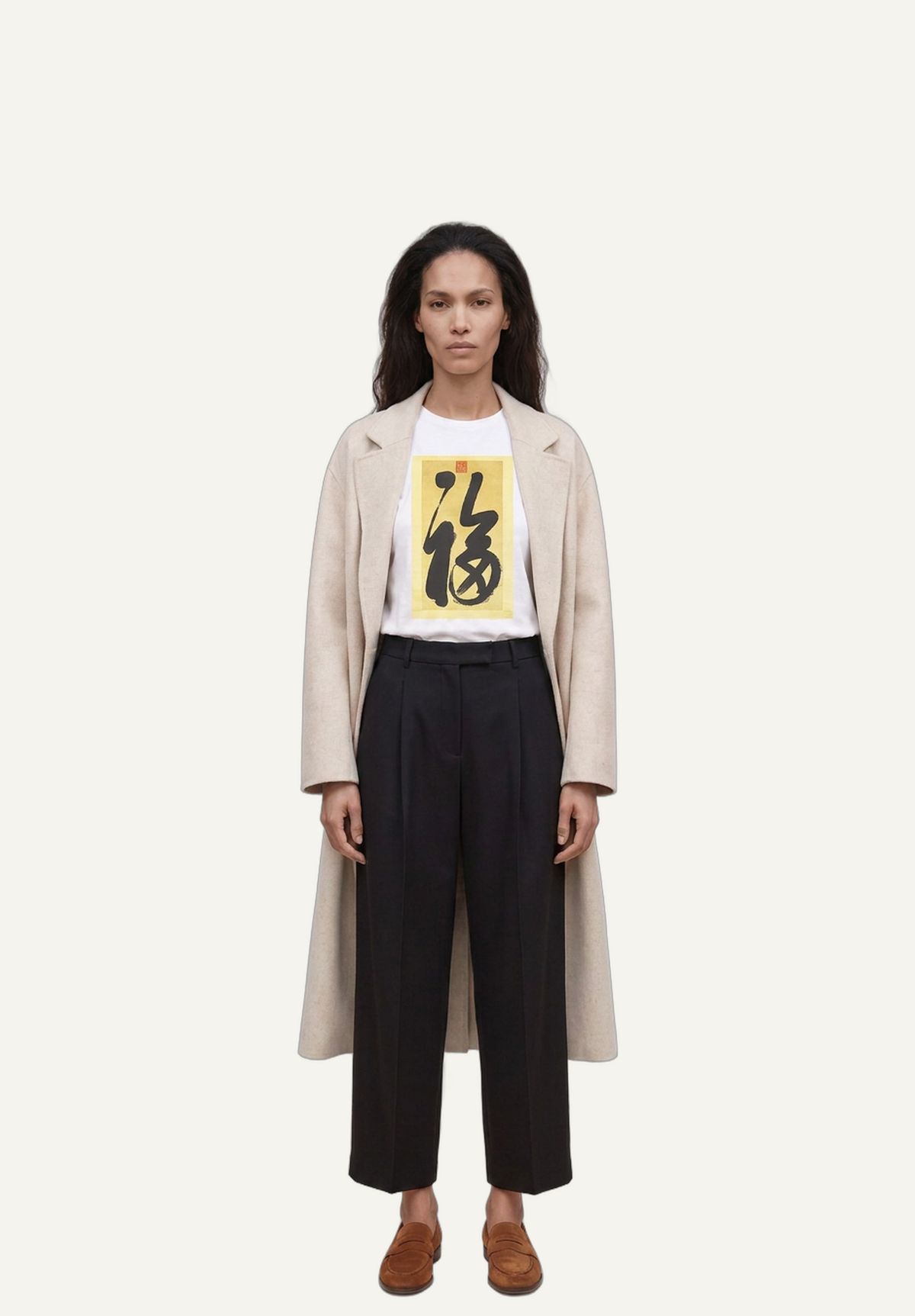Editorial art shirt for women — Art Smart Wear This is Happiness Shirt in white cotton, styled with an oatmeal wool coat, black wide-leg trousers and tobacco suede loafers